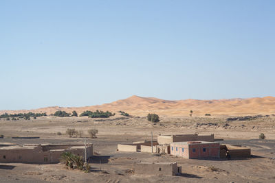 Scenic view of desert against clear sky