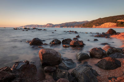 Scenic view of sea against sky during sunset