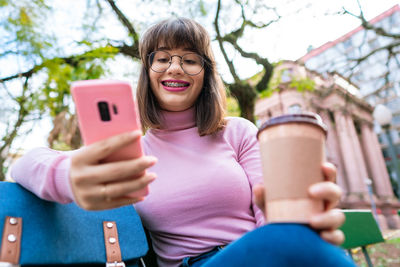 Young woman using mobile phone