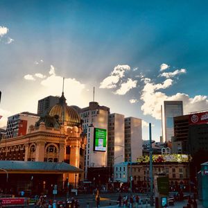 Buildings in city against sky