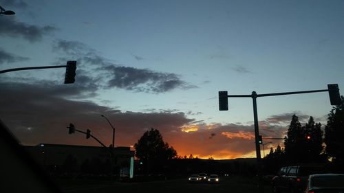 Low angle view of building against sky at dusk