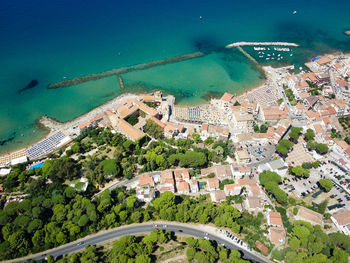 High angle view of city by sea