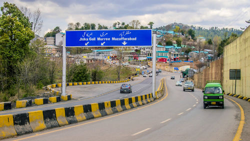 Road sign on street in city