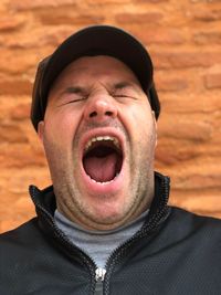 Close-up angry man screaming