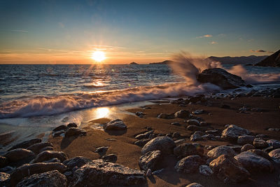 Scenic view of sea against sky during sunset