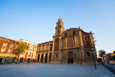 View of historic building against clear blue sky