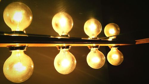 Low angle view of lamp hanging on ceiling
