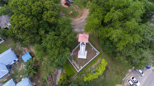 High angle view of street amidst trees in city