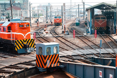 Train at railroad station in city