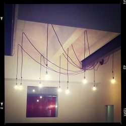 Low angle view of illuminated lights