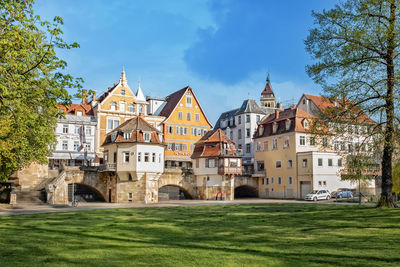 View of buildings against cloudy sky