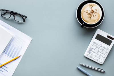 High angle view of coffee cup on table