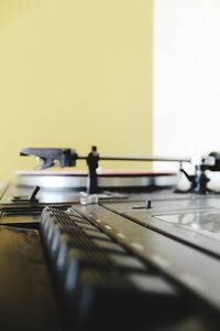 Close-up of piano keys on table