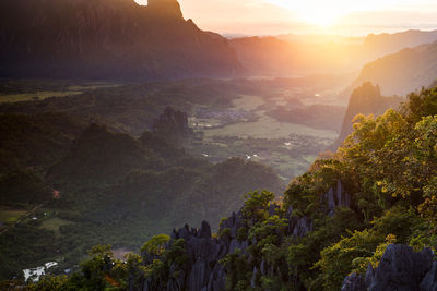 Scenic view of mountains against sky during sunset