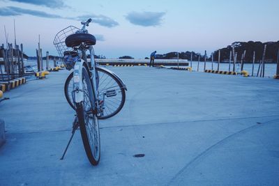Bicycle against sky in city