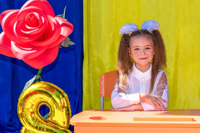 Lisichansk, ukraine. september 1, 2021 - a girl with looks at the camera. back to school.