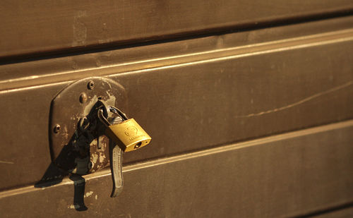 High angle view of padlocks on wall