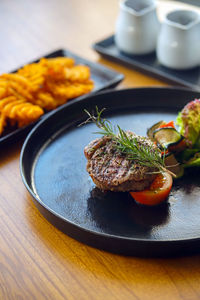 Close-up of food in plate on table