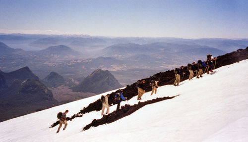 Group of people on snow covered land