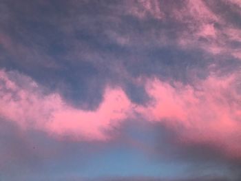 Low angle view of dramatic sky during sunset