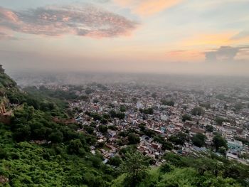 High angle view of townscape against sky during sunset