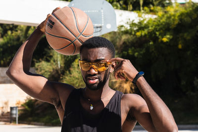 Portrait of young man wearing sunglasses