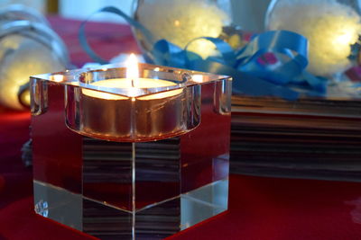 Close-up of tea light candles on table