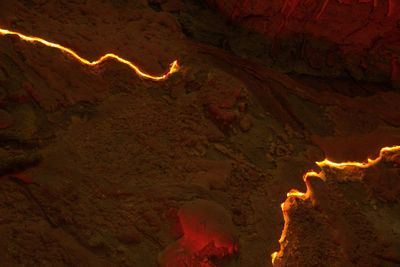 High angle view of illuminated mountain at night