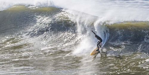 Man surfing in river