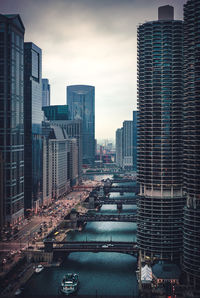 Modern buildings in city against sky