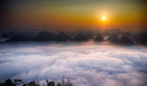 Scenic view of mountains against sky during sunset