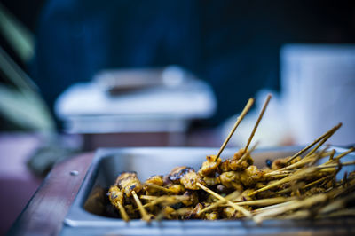 Close-up of skewered chicken