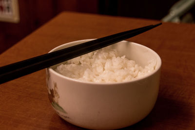 Close-up of rice in bowl on table