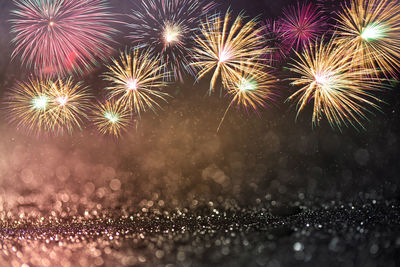 Firework display at night