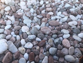 Full frame shot of pebbles at beach