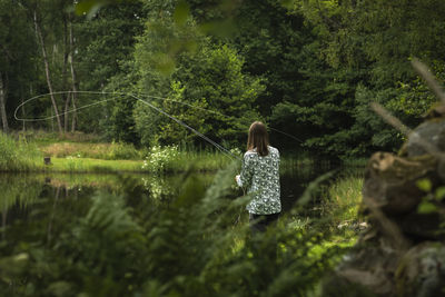 View of man fishing