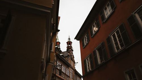 Low angle view of buildings in city against sky