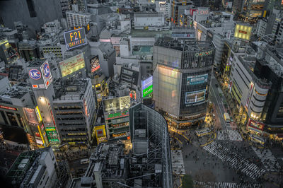 High angle view of illuminated buildings in city