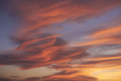 Low angle view of dramatic sky during sunset