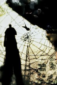 Shadow of man on wall