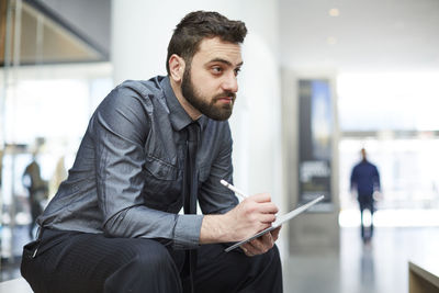 Young man using smart phone