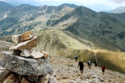 Scenic view of rocks with mountains in background