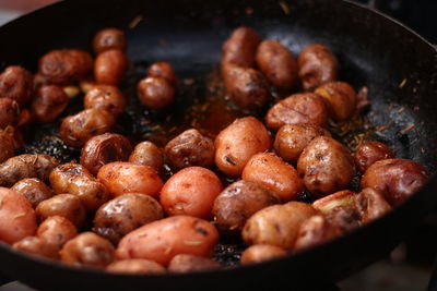 Close-up of meat in cooking pan