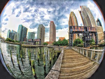 View of bridge against cloudy sky