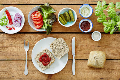 High angle view of breakfast served on table