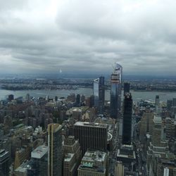 High angle view of buildings in city against sky