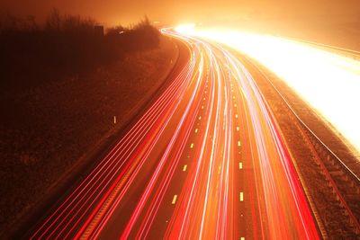 Light trails on road at night