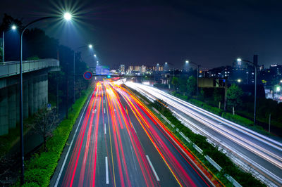 High angle view of light trails on city street