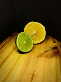 Close-up of lemon slice on table