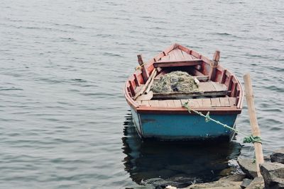 Boat moored on sea